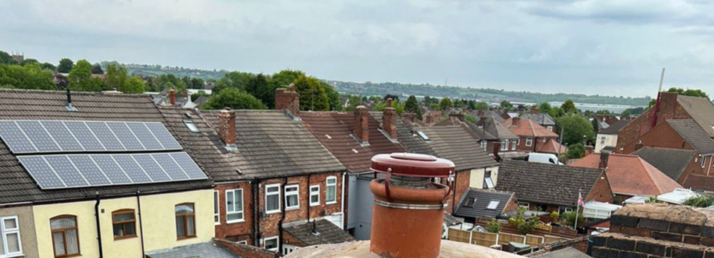 This is a photo taken from a roof which is being repaired by LS Roofing Great Missenden, it shows a street of houses, and their roofs
